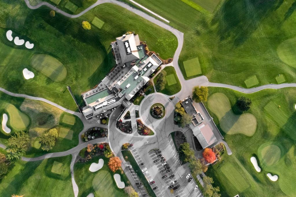 Aerial view of a golf course within a luxury real estate township