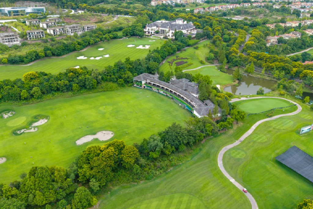 An aerial view of a beautifully integrated golf course and luxury residential community