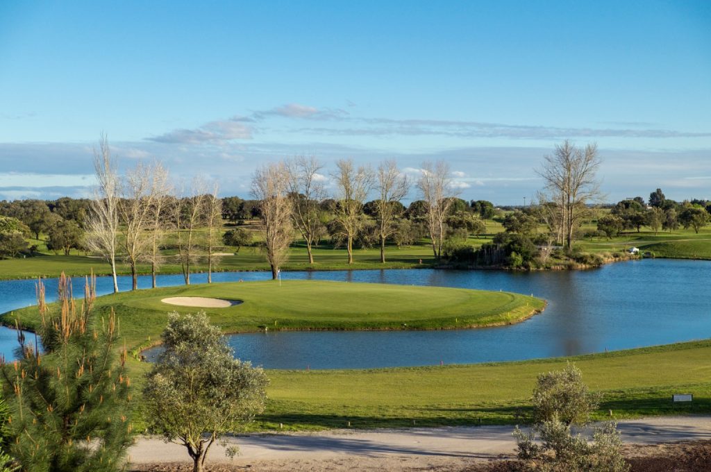 An aerial view showing the strategic routing of a golf course designed to maximize residential property frontage.
