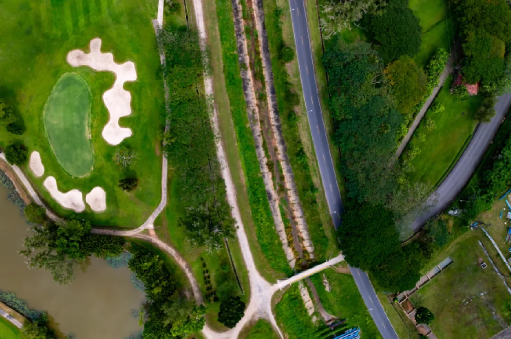 An aerial view showing the strategic routing of a golf course designed to maximize residential property frontage