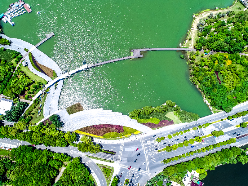 Aerial view of a championship course showcasing natural water channels and large ponds.