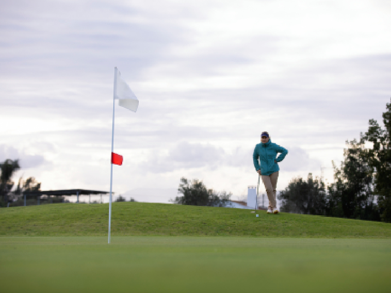 Image of a championship course featuring uniquely shaped bunkers with dramatic shadows.