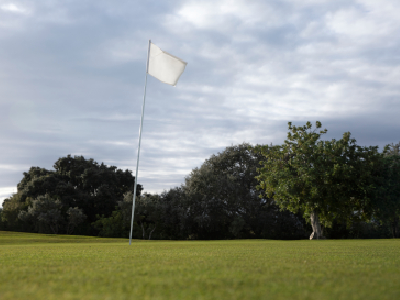 Before-and-after overlay view of a historic golf green complex undergoing expansion and restoration shaping