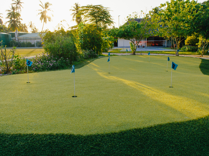 A wide view of a modern championship course showcasing sustainable golf design and infrastructure resilience.